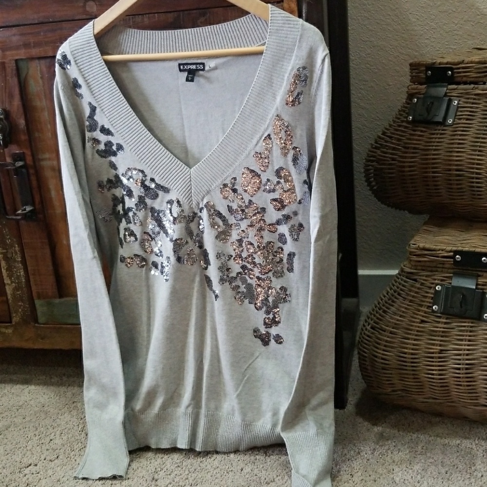 Sweater with sequined embellishments